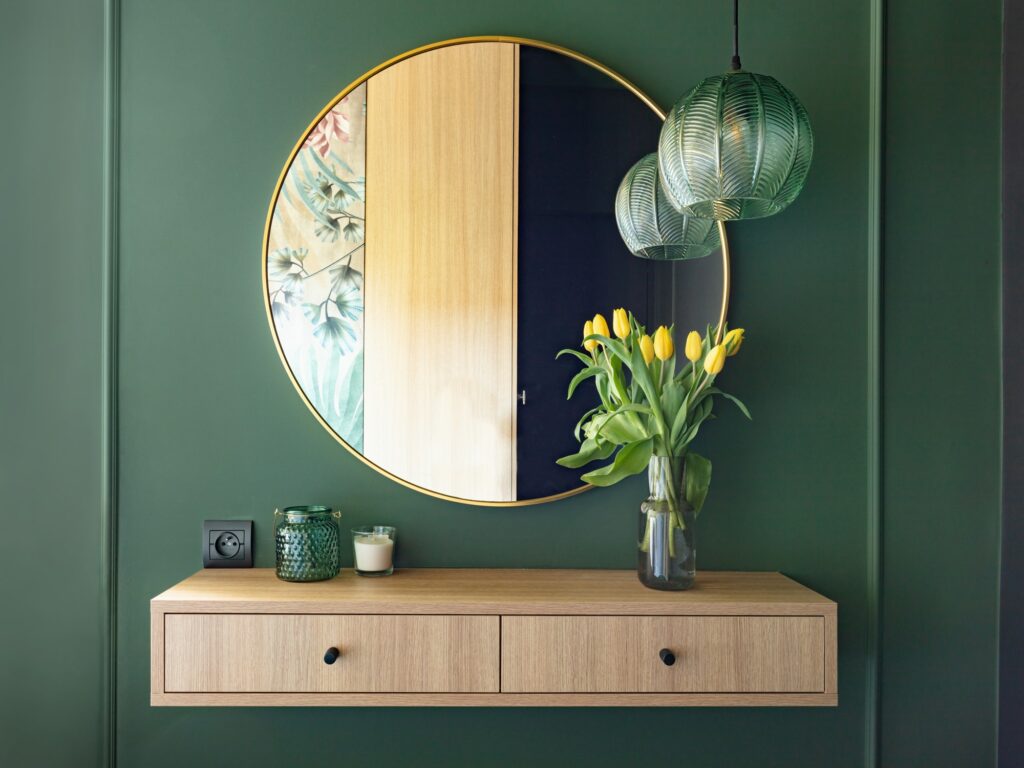 Dressing table with elegant round mirror. Home staging